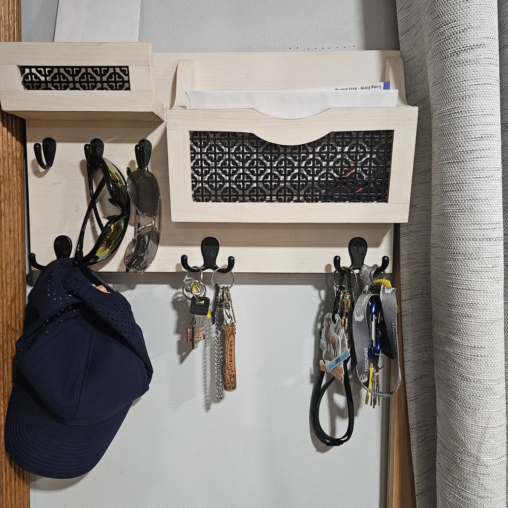 Wall-Mounted Organizer with Hooks - Cream and Black.